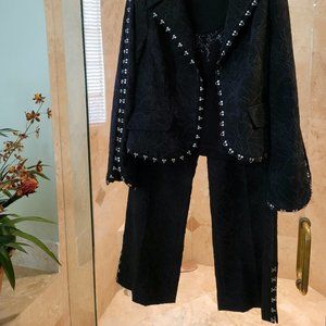 Studded pants suit by Albert makali